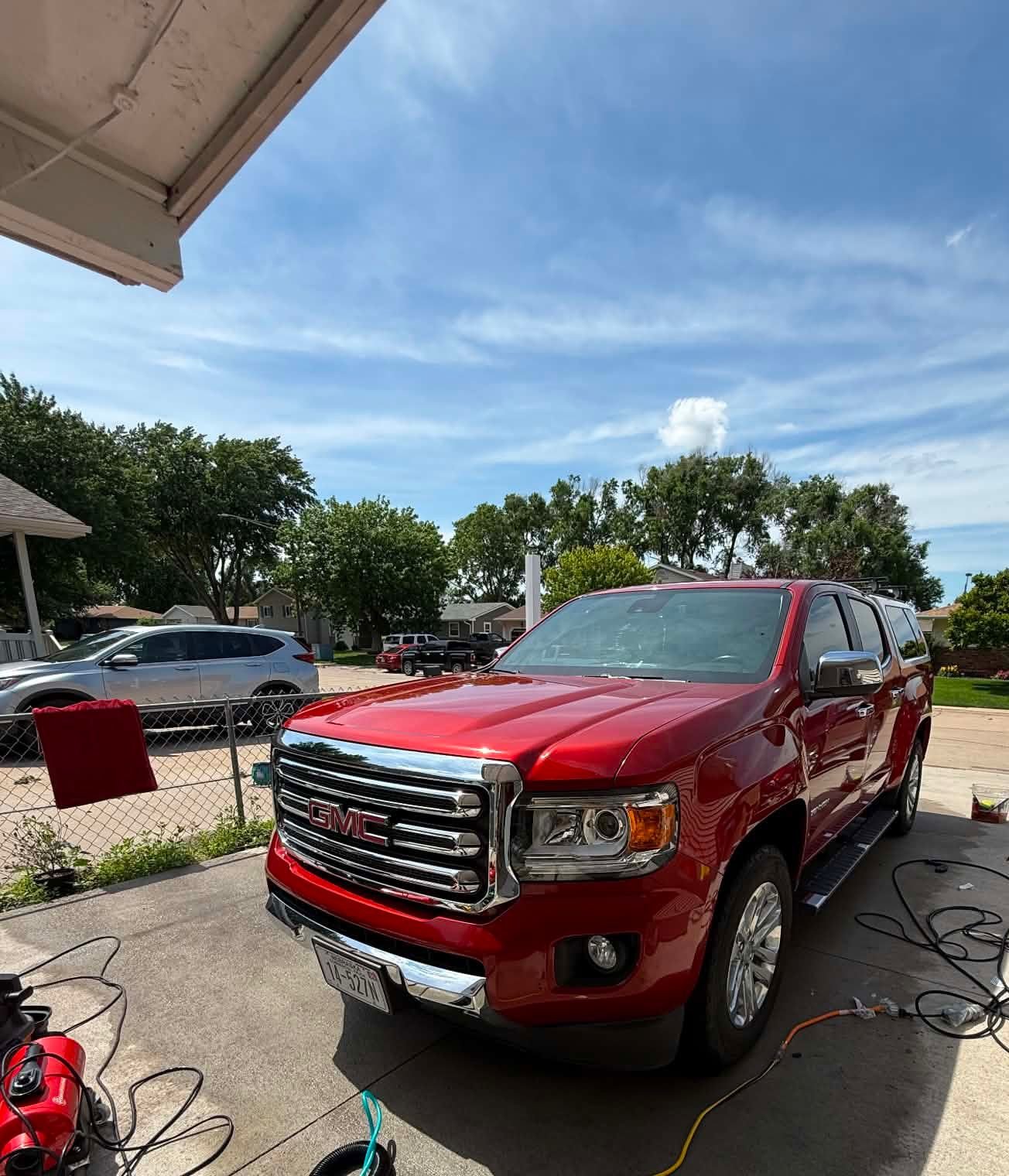 Red GMC truck after exterior detailing